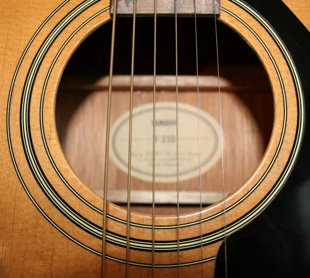 Yamaha F310 sound hole and strings